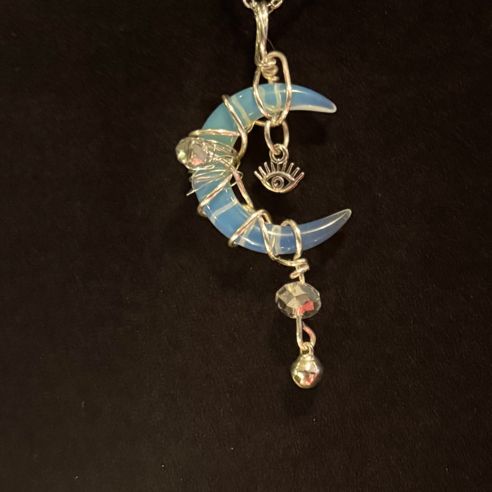 Handmade wire wrapped genuine Opilate stone pendant and chain.